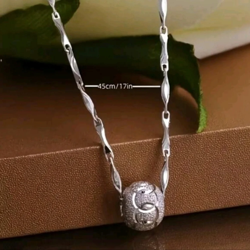 Elegant sterling silver necklace spinning bead pendant plus gift box